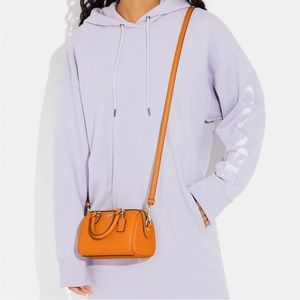 NWT Coach Mini Rowan in Bright Mandarin